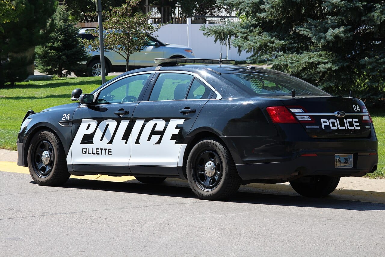 A parked police patrol car, the kind of sighting Waze users report to each other. Photo: Mr. Satterly, Wikimedia Commons, CC0 (Public Domain).