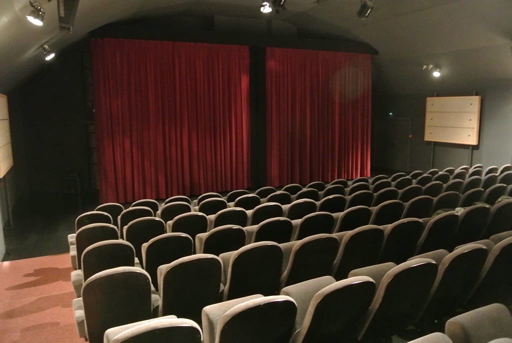 Rows of empty movie theater seats