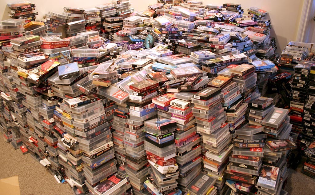 A huge pile of stacked VHS tapes